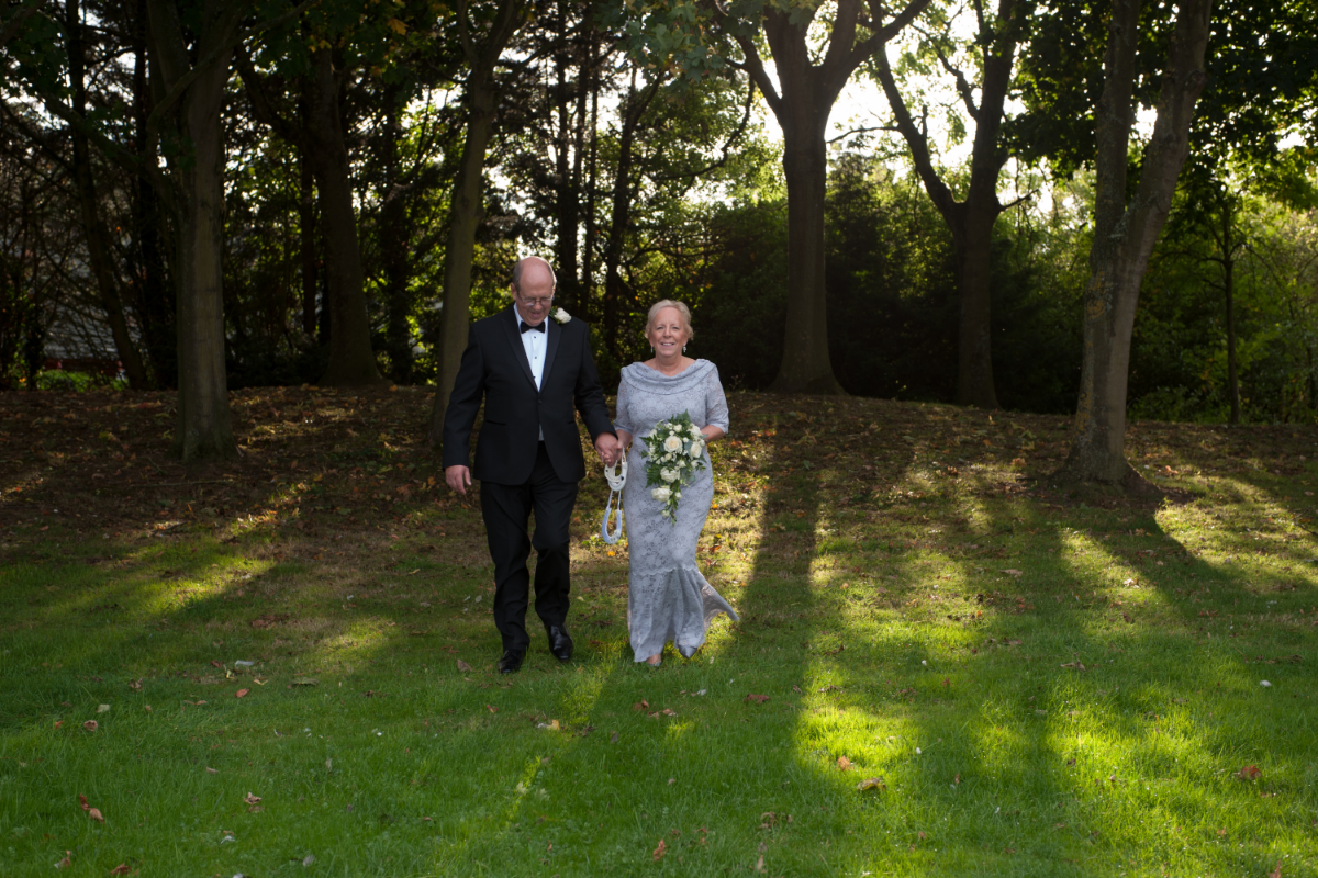 wedding venue rugby Northampton bride and groom walking.