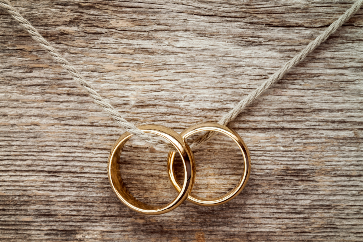 two wedding rings on a rope